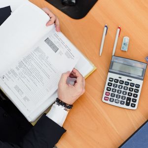 calculator-close-up-desk-hands